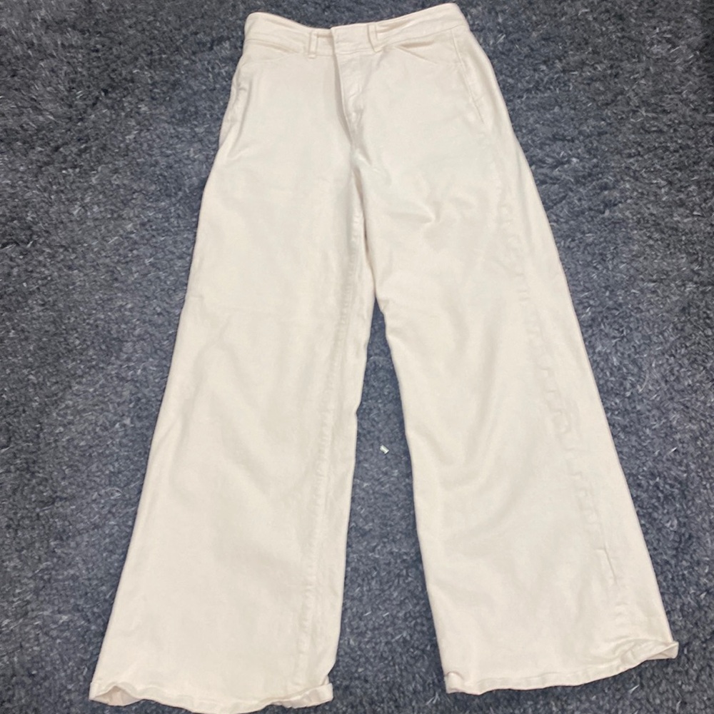 Cream wide leg high rise jeans.by Ann Taylor
